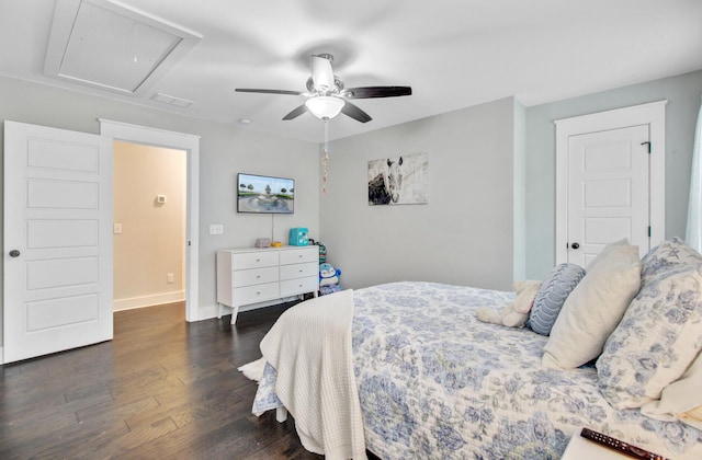 6190 Button Bush Dr, Ravenel, SC 29470 - bedroom featuring attic access, dark wood-type flooring, baseboards, and ceiling fan