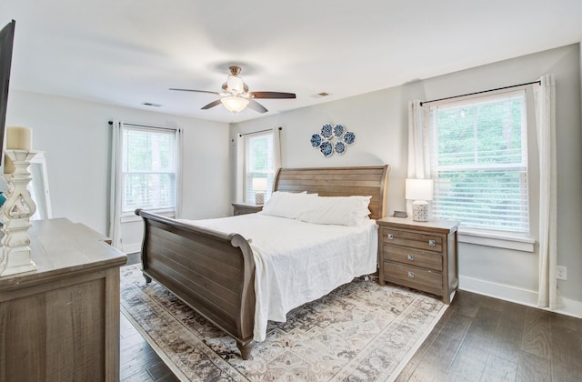 6190 Button Bush Dr, Ravenel, SC 29470 - bedroom featuring wood-type flooring, a ceiling fan, and baseboards