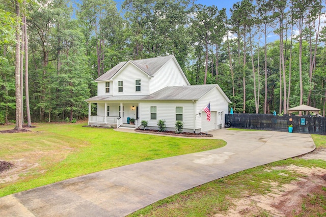 6190 Button Bush Dr, Ravenel, SC 29470 - view of front of house with a porch, an attached garage, and concrete driveway