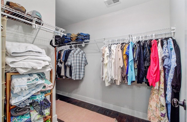 6190 Button Bush Dr, Ravenel, SC 29470 - walk in closet with wood finished floors