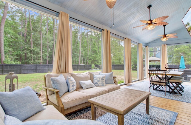 6190 Button Bush Dr, Ravenel, SC 29470 - sunroom / solarium with an outdoor living space, a ceiling fan, outdoor dining area, plenty of natural light, and vaulted ceiling