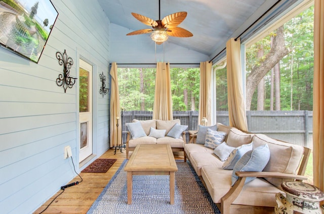 6190 Button Bush Dr, Ravenel, SC 29470 - sunroom / solarium with vaulted ceiling, wood finished floors, wood walls, and a deck