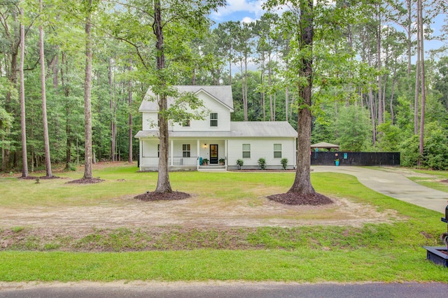 6190 Button Bush Dr, Ravenel, SC 29470 - modern inspired farmhouse featuring a porch, concrete driveway, and a detached carport
