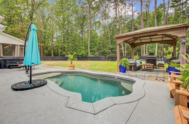 6190 Button Bush Dr, Ravenel, SC 29470 - view of swimming pool featuring a gazebo, an outdoor living space with a fireplace, a patio area, and a hot tub