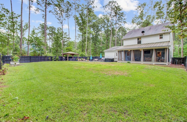 6190 Button Bush Dr, Ravenel, SC 29470 - view of yard featuring a sunroom and a gazebo