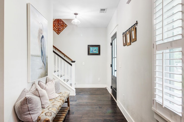 6190 Button Bush Dr, Ravenel, SC 29470 - foyer featuring stairs, dark wood-type flooring, and baseboards