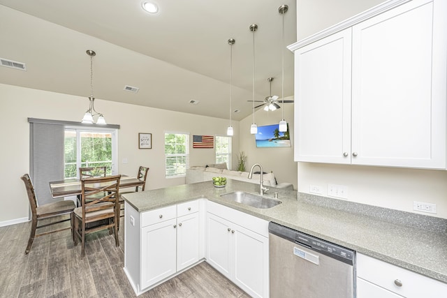 kitchen with a sink, visible vents, light wood-style floors, and dishwasher