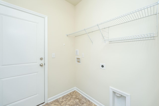 laundry area with hookup for an electric dryer, baseboards, laundry area, and hookup for a washing machine