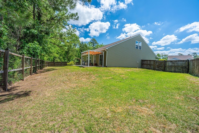 view of yard with a fenced backyard, a patio, and a pergola