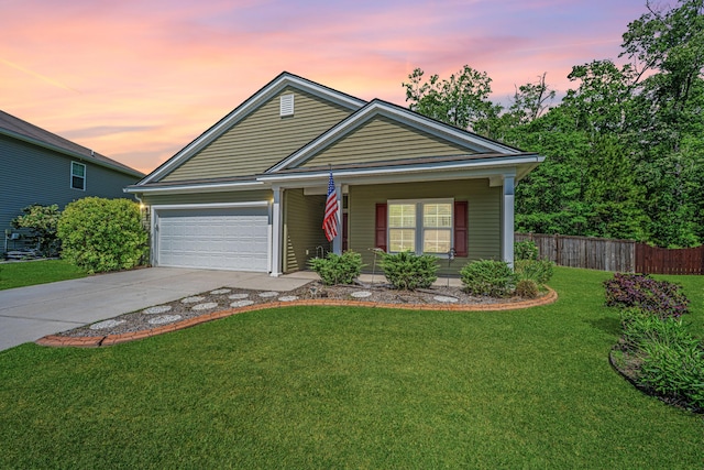view of front of home featuring fence, an attached garage, a front lawn, a porch, and driveway