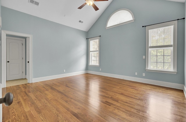 unfurnished room featuring visible vents, baseboards, and ceiling fan