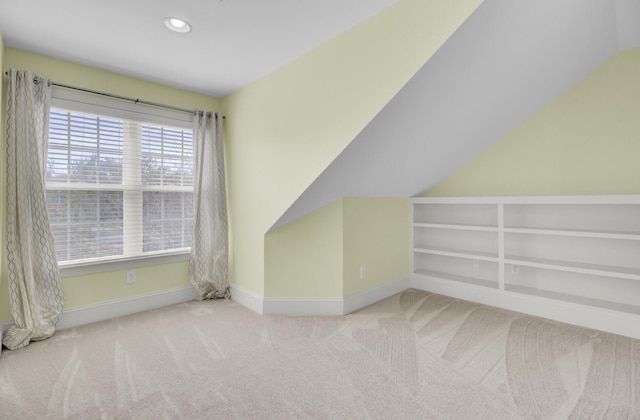 bonus room featuring lofted ceiling, recessed lighting, baseboards, and carpet floors