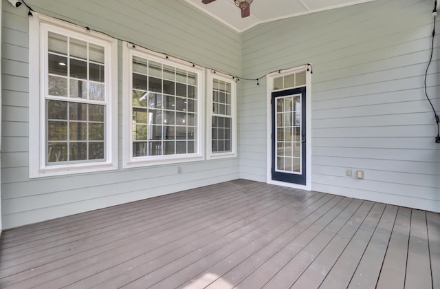 wooden terrace with ceiling fan