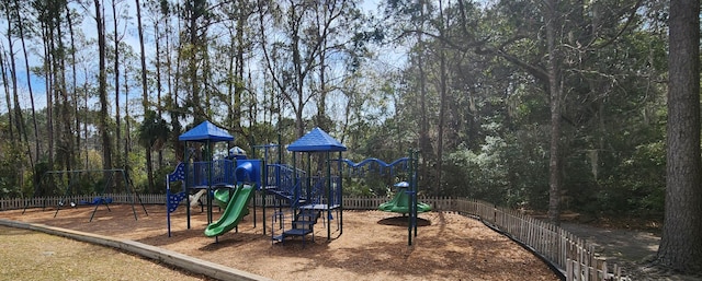 community jungle gym with fence