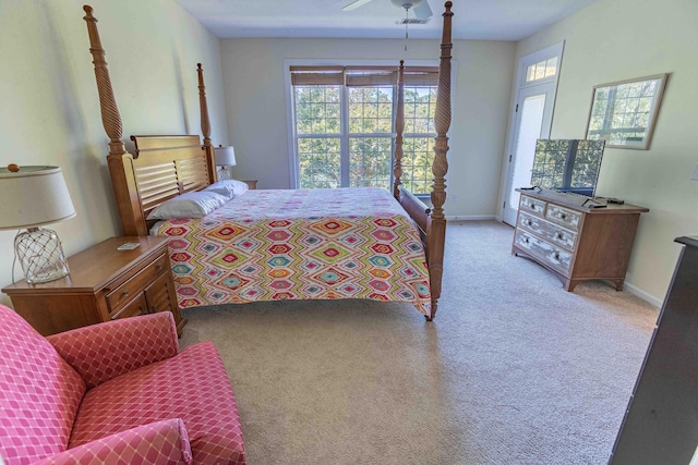 bedroom featuring light colored carpet and ceiling fan