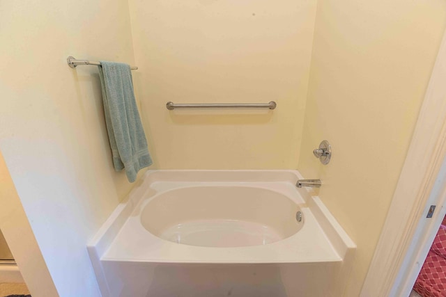 bathroom featuring a washtub