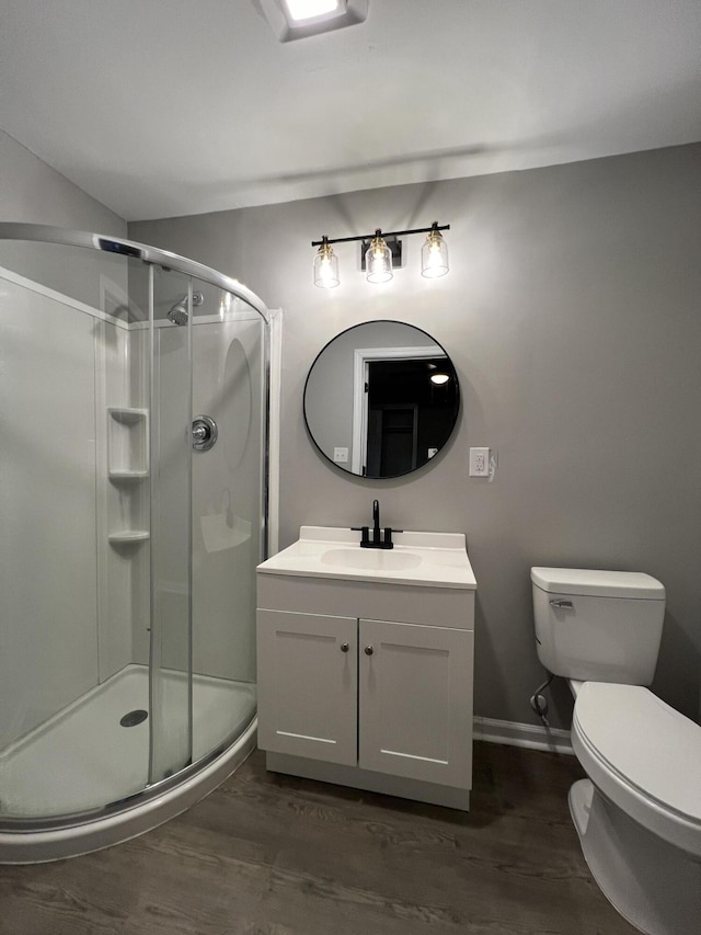 105 Bermuda Ct, Summerville, SC 29485 - bathroom with a stall shower, wood finished floors, toilet, vanity, and baseboards