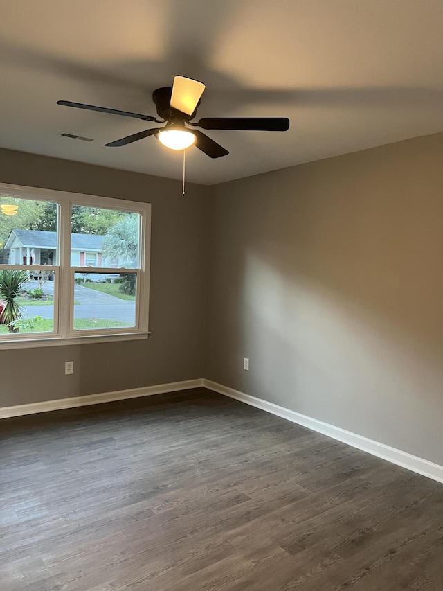 105 Bermuda Ct, Summerville, SC 29485 - empty room with dark wood-type flooring, ceiling fan, and baseboards