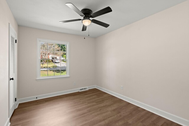 105 Bermuda Ct, Summerville, SC 29485 - unfurnished bedroom with dark wood-style floors, baseboards, a ceiling fan, and a closet