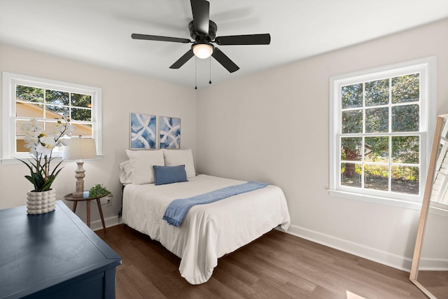105 Bermuda Ct, Summerville, SC 29485 - bedroom with baseboards, dark wood-style flooring, and a ceiling fan