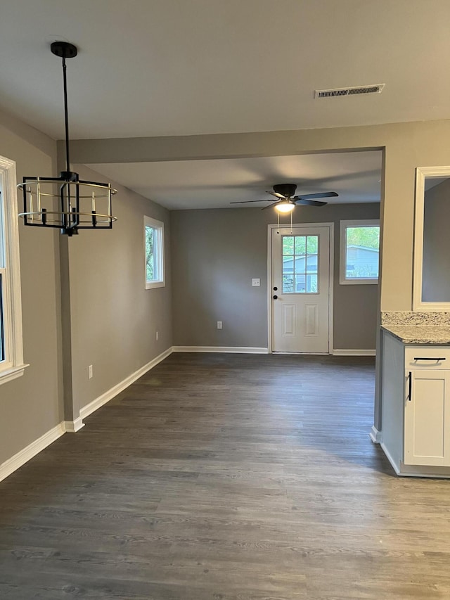 105 Bermuda Ct, Summerville, SC 29485 - unfurnished dining area featuring a chandelier, wood finished floors, and baseboards