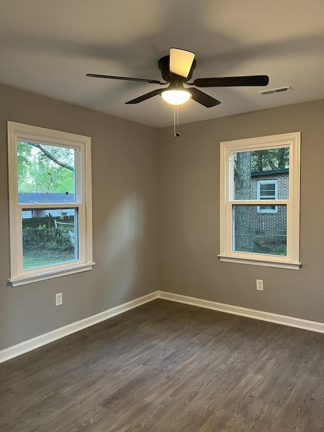 105 Bermuda Ct, Summerville, SC 29485 - empty room featuring dark wood-type flooring, a ceiling fan, and baseboards