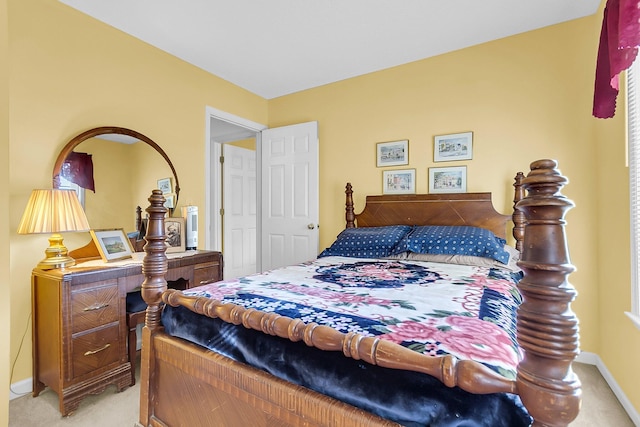 bedroom with light carpet