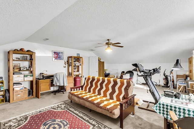 living room with a textured ceiling, light colored carpet, vaulted ceiling, and ceiling fan