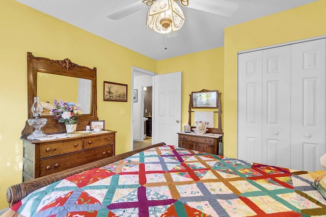 bedroom with a textured ceiling, a closet, and ceiling fan