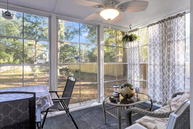 sunroom / solarium with ceiling fan