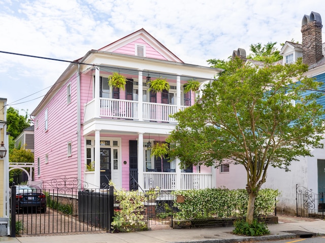 view of front of home with a balcony