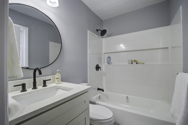 full bathroom with vanity, bathtub / shower combination, and toilet