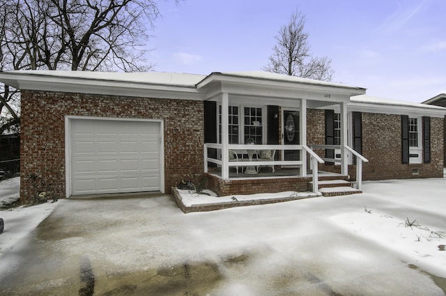 view of front of property featuring a garage