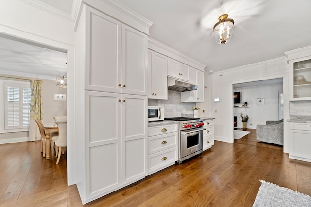 kitchen with designer range, ventilation hood, wood-type flooring, and white cabinetry