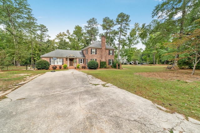 view of front of home with a front lawn and a porch