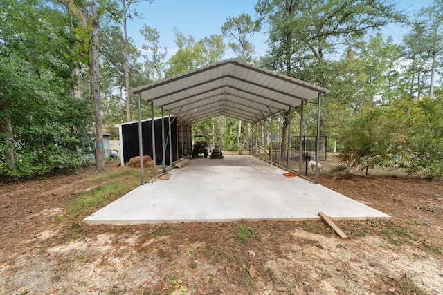 view of vehicle parking featuring a carport