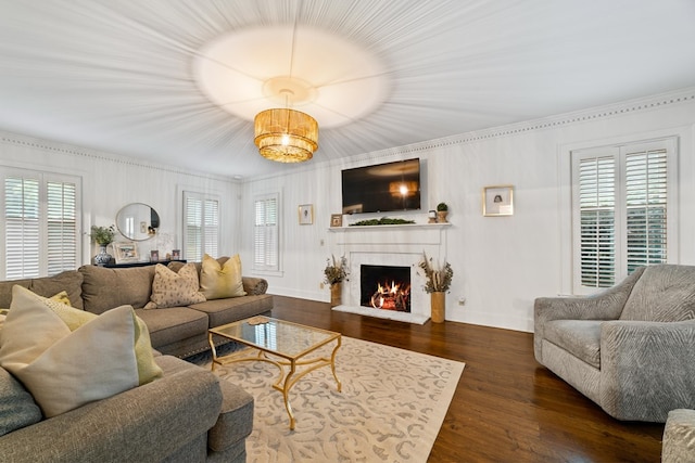 living room featuring plenty of natural light and dark wood-type flooring