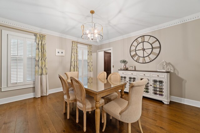 dining area featuring ornamental molding, dark hardwood / wood-style floors, and a notable chandelier