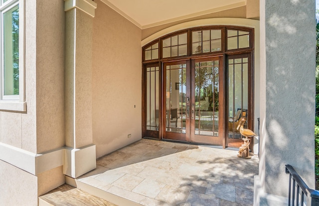 12 Port Tack, Hilton Head Island, SC 29928 - view of exterior entry featuring french doors and stucco siding