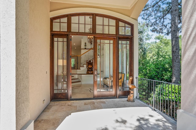 12 Port Tack, Hilton Head Island, SC 29928 - view of exterior entry featuring stucco siding and a balcony