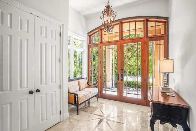 12 Port Tack, Hilton Head Island, SC 29928 - foyer featuring french doors and a chandelier
