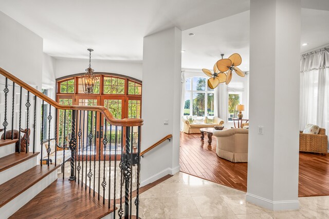 12 Port Tack, Hilton Head Island, SC 29928 - entryway featuring healthy amount of natural light, baseboards, a chandelier, stairs, and recessed lighting