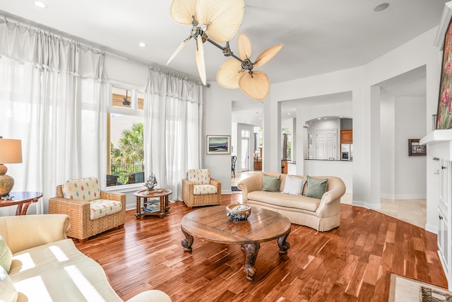 12 Port Tack, Hilton Head Island, SC 29928 - living area with wood finished floors, baseboards, arched walkways, and recessed lighting