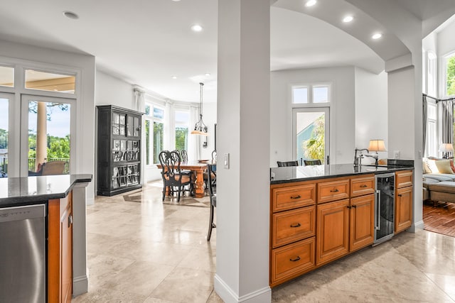12 Port Tack, Hilton Head Island, SC 29928 - kitchen with dishwasher, beverage cooler, healthy amount of natural light, brown cabinetry, and recessed lighting