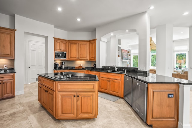 12 Port Tack, Hilton Head Island, SC 29928 - kitchen with dishwashing machine, a sink, black electric stovetop, a peninsula, and recessed lighting