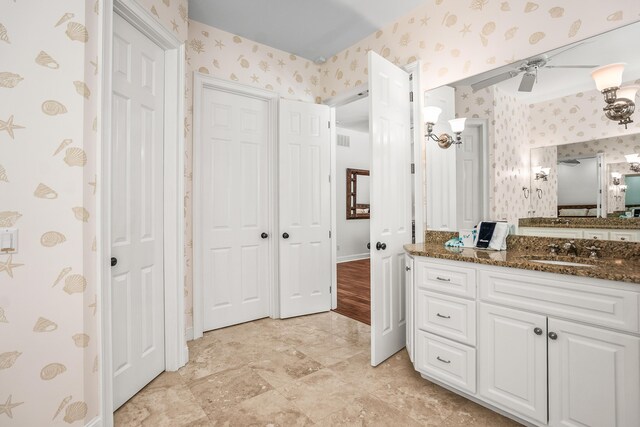 12 Port Tack, Hilton Head Island, SC 29928 - bathroom with wallpapered walls, ceiling fan, and vanity