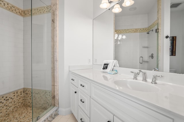 12 Port Tack, Hilton Head Island, SC 29928 - bathroom with a chandelier, a shower stall, vanity, toilet, and tile patterned flooring