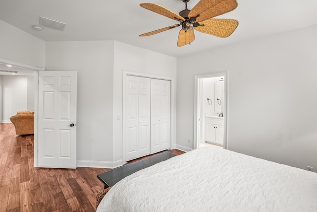 12 Port Tack, Hilton Head Island, SC 29928 - bedroom featuring wood finished floors, a closet, baseboards, and ensuite bathroom