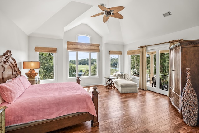 12 Port Tack, Hilton Head Island, SC 29928 - bedroom featuring access to exterior, high vaulted ceiling, ceiling fan, wood finished floors, and baseboards