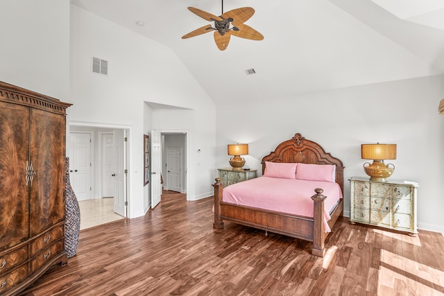 12 Port Tack, Hilton Head Island, SC 29928 - bedroom with high vaulted ceiling, wood finished floors, baseboards, and ceiling fan